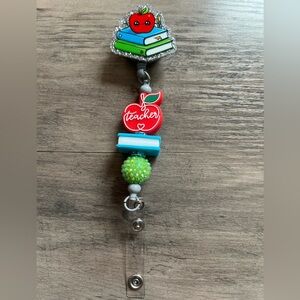Teacher badge reel